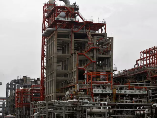 an employee walks inside the premises of an oil refinery of essar oil which runs india s second biggest private sector refinery in vadinar in the western state of gujarat india october 4 2016 picture taken october 4 2016 photo reuters